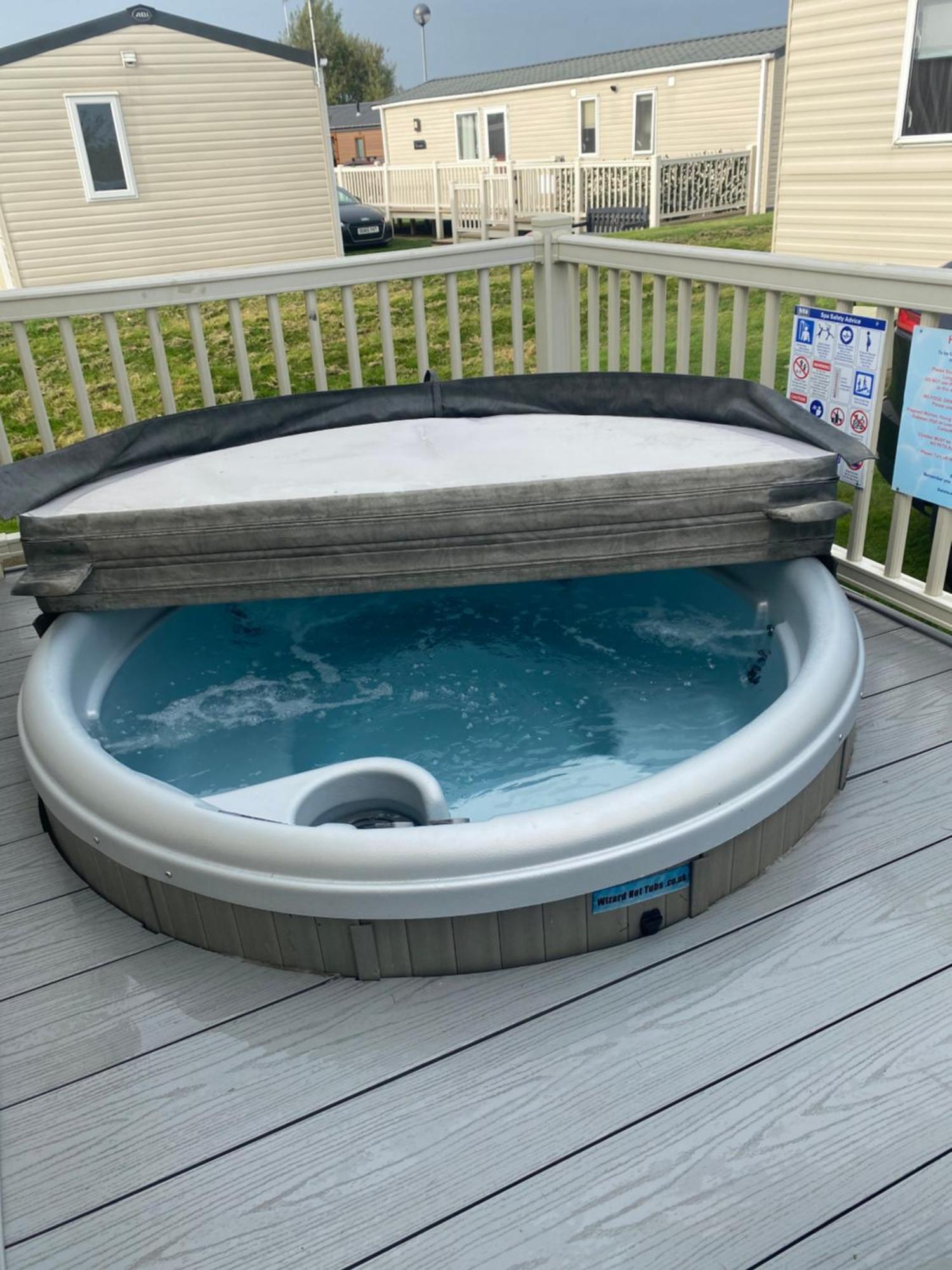 Lancaster Crescent Hot Tub Hideaway *